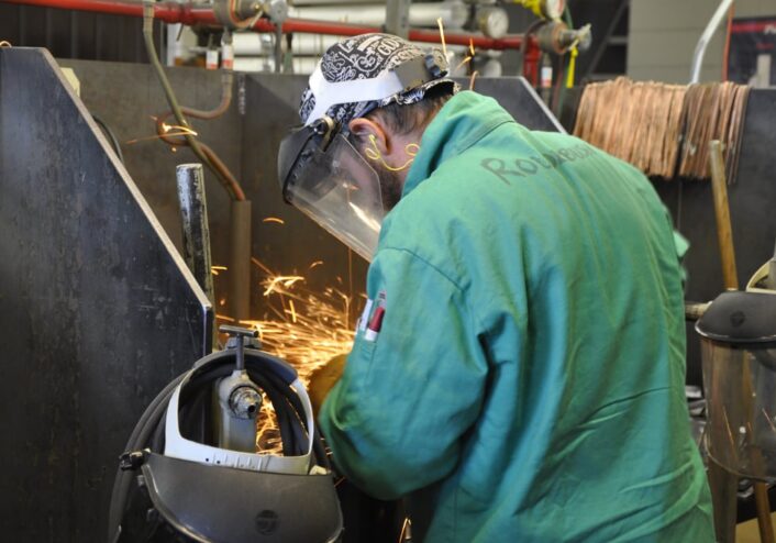 A first year apprentice works in the welding lab while taking the Accelerated Welding Program at the Piping Industry Training Center.